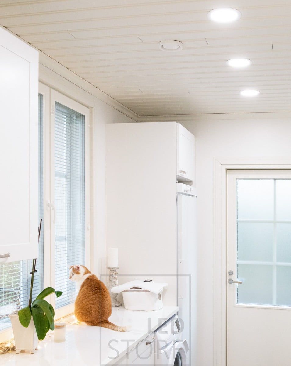 Multifunctional circular LED panel illuminating the utility room with even and efficient general lighting. The luminaire has a sophisticated and timeless design. Ledstore.fi